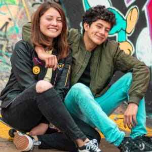 Photo of a smiling young couple.